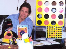Howard Wexler Portrait with his Games
