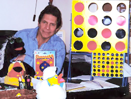 Howard Wexler Portrait with his Games